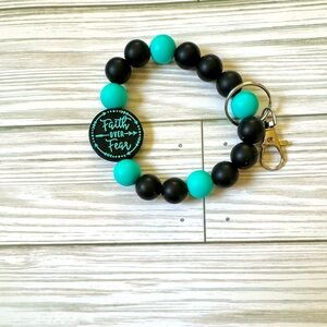 Teal Faith Over Fear Silicone Wristlet